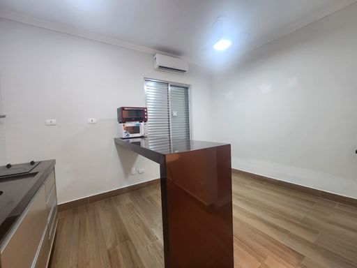 Cozinha Americana com Bancada integrada com Dormitório