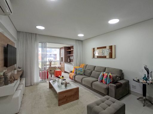 A sala de estar com um design moderno e convidativo.