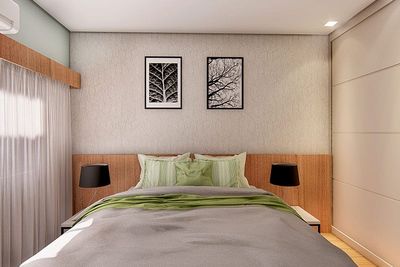Quarto com guarda-roupas embutido.