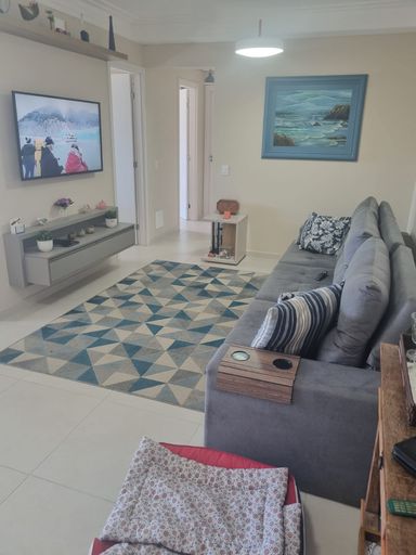 Sala ampla e integrada, perfeita para receber amigos e viver momentos inesquecíveis.