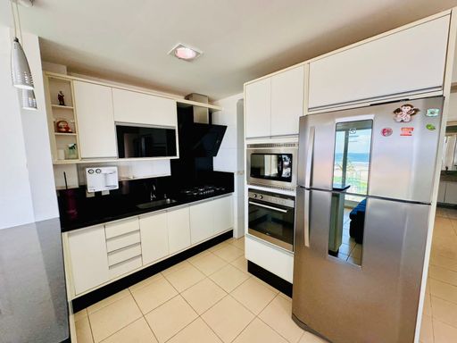 Cozinha planejada perfeita para quem ama praticidade e estilo.