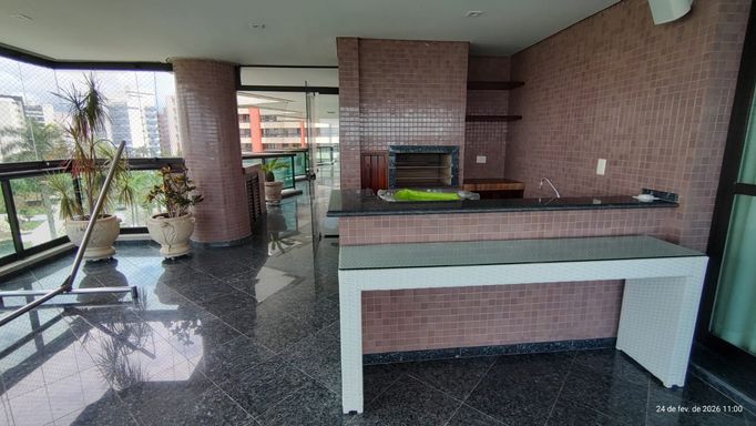 Salão de festas amplo e elegante, ideal para eventos memoráveis.