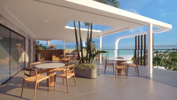 Área de conviência moderna com design aberto e ventilação natural