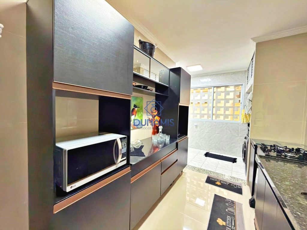 APARTAMENTO REFORMADO COM VAGA DE GARAGEM A DUAS QUADRAS DA PRAIA DA PITANGUEIRA em Pitangueiras, Guarujá — foto 25