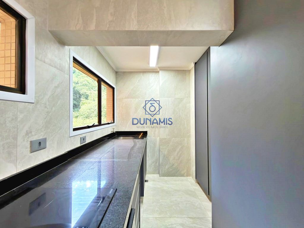 APARTAMENTO TOTALMENTE REFORMADO TRÊS DORMITORIOS - LAZER COMPLETO - 2 VAGAS em Pitangueiras, Guarujá — foto 32