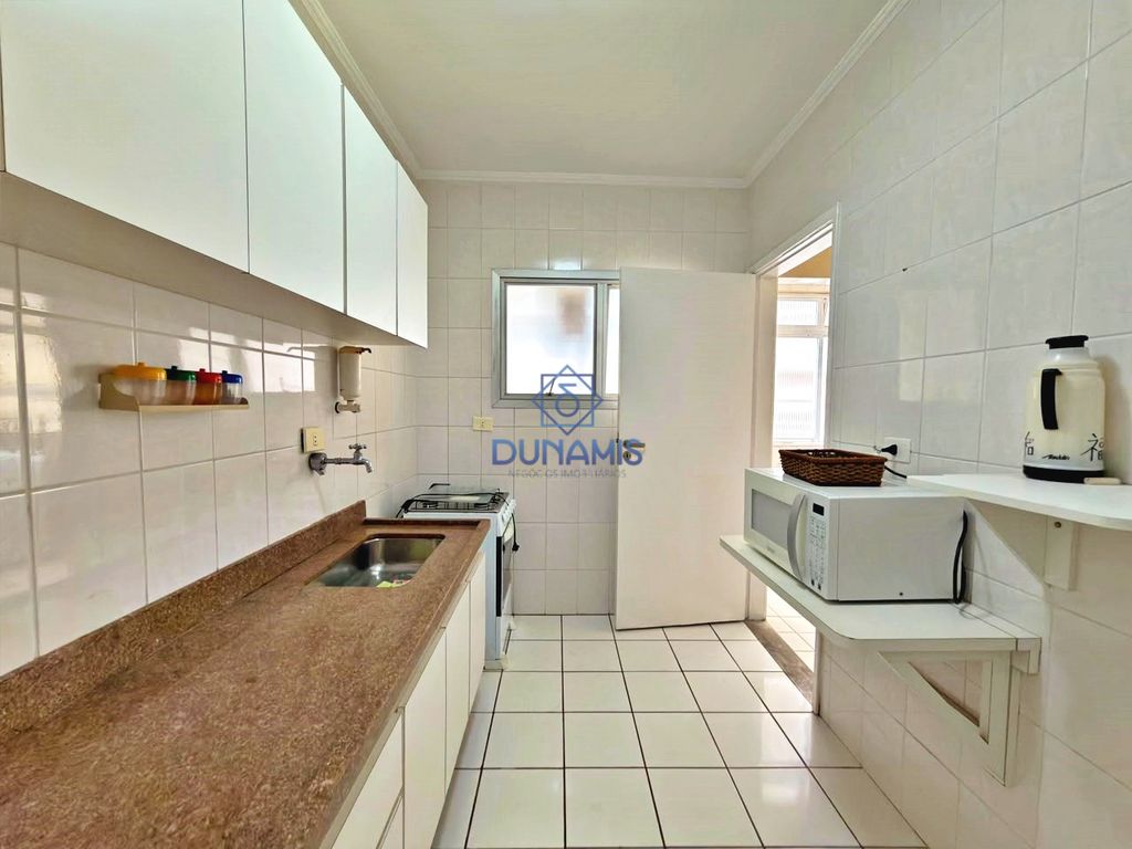APARTAMENTO CONSERVADO COM UMA VISTA PANORAMICA PARA AS ARVORES COM VAGA em Pitangueiras, Guarujá — foto 26