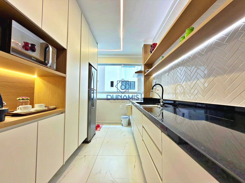 APARTAMENTO REFORMADO LINDISSIMO UMA VISTA PANORAMICA PARA AS ARVORES COM VAGA em Pitangueiras, Guarujá — foto 36