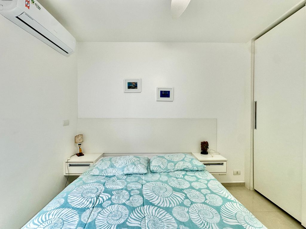 APARTAMENTO TOTALMENTE REFORMADO À VENDA NA PRAIA DAS ASTÚRIAS -FRENTE TOTAL MAR em Jardim Astúrias, Guarujá — foto 21