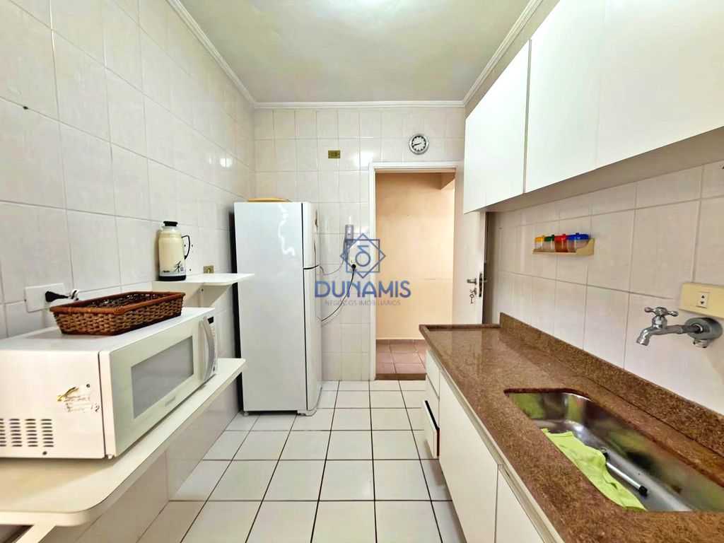 APARTAMENTO CONSERVADO COM UMA VISTA PANORAMICA PARA AS ARVORES COM VAGA em Pitangueiras, Guarujá — foto 25