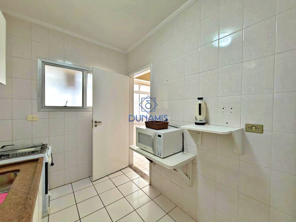 APARTAMENTO CONSERVADO COM UMA VISTA PANORAMICA PARA AS ARVORES COM VAGA em Pitangueiras, Guarujá — foto 23