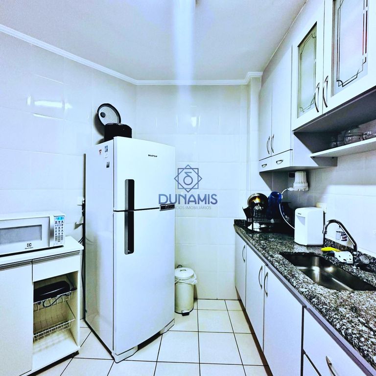 Apartamento reformado com sacada na Praia das Astúrias, área nobre do Guarujá em Jardim Astúrias, Guarujá — foto 7