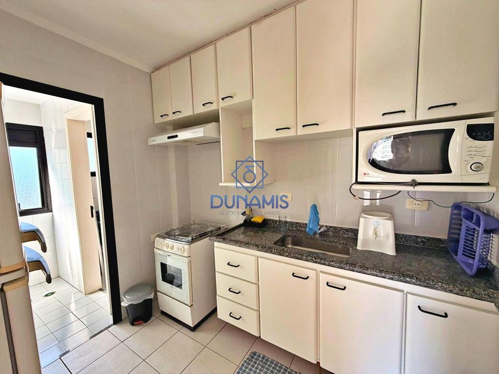*** Apartamento conservado com sacada e vista para o mar da Praia das Astúrias** em Jardim Astúrias, Guarujá — foto 17