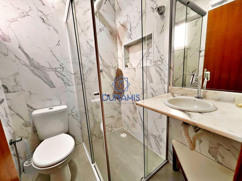 APARTAMENTO NA QUADRA DA PRAIA DE PITANGUEIRAS - REGIÃO CENTRAL - VISTA MAR em Pitangueiras, Guarujá — foto 13