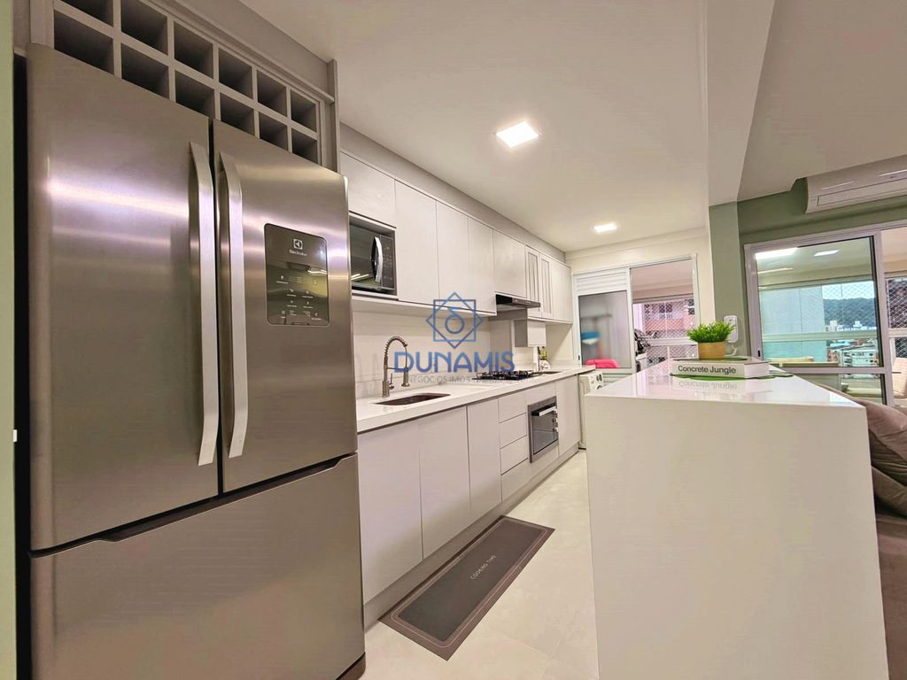 APARTAMENTO TOTALMENTE REFORMADO À VENDA NA REGIÃO CENTRAL DA PRAIA DAS ASTÚRIAS em Jardim Astúrias, Guarujá — foto 7