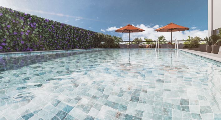 Área da piscina do novo empreendimento na Vila Mirim, Praia Grande, integrada ao lazer completo e próxima à praia e ao futuro Villamar Shopping.