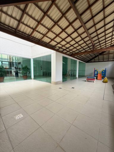 Salão de festas com churrasqueira