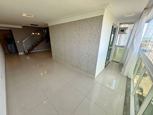 Sala com Varanda integrada e vista para o mar