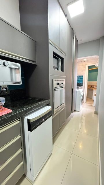 Cozinha americana com marcenaria e mobilia completa