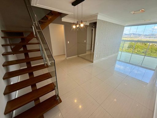 Sala com Varanda integrada e vista para o mar