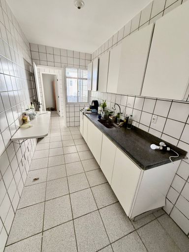 Cozinha totalmente independente da área de serviço