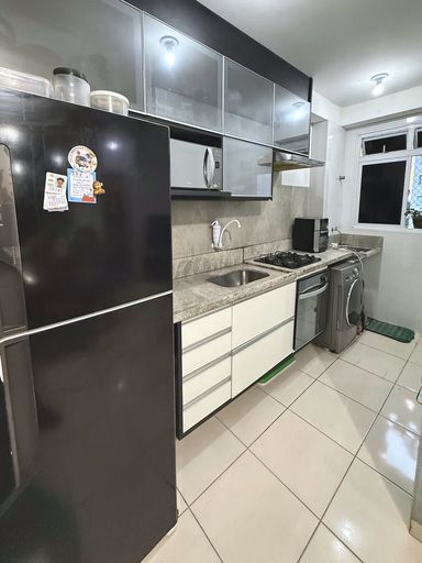 Cozinha reformada com armários