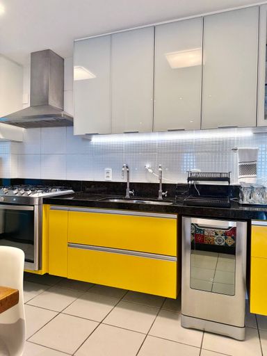 Cozinha tipo americana com armários