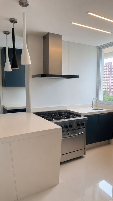 Cozinha 03 onde este fogão está sendo trocado por um cooktop