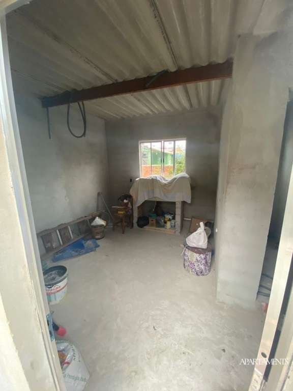  - 
				Terreno com 3 Casas com 3 vagas de carro e moto.
			