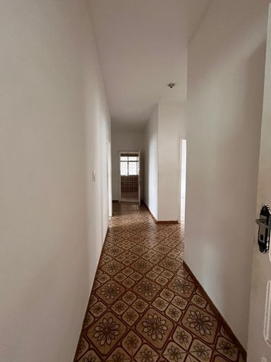 Corredor de acesso aos quartos e cozinha