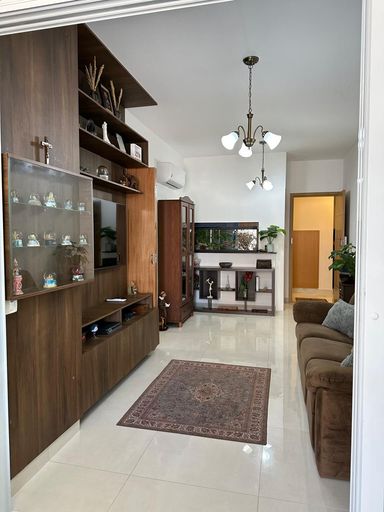 Sala 2 ambientes integrada com a varanda