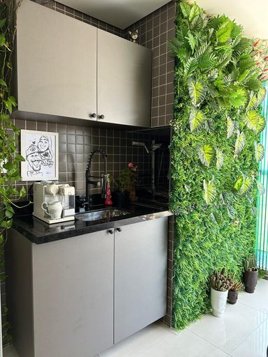 Varanda gourmet integrada com a sala - Churrasqueira