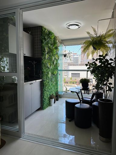 Varanda gourmet integrada com a sala - Churrasqueira