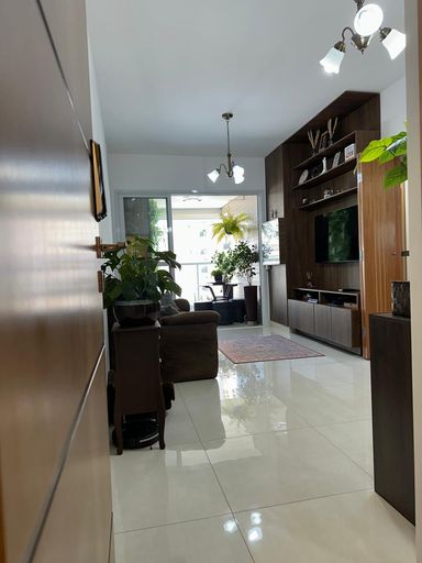 Sala 2 ambientes integrada com a varanda