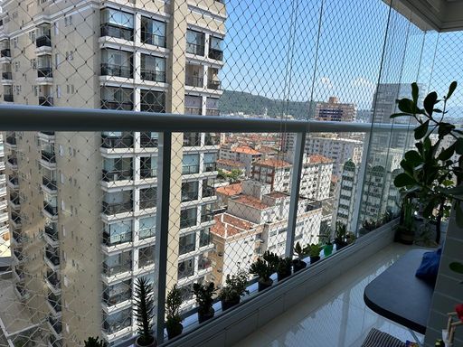 Sala 2 ambientes integrada com a varanda