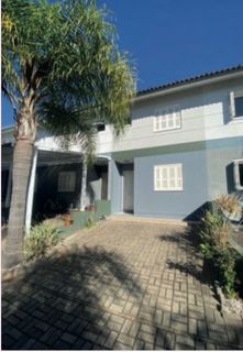 CASA COM TRES DORMITORIOS A VENDA CONDOMINIO BELA VISTA, TORRES-RS