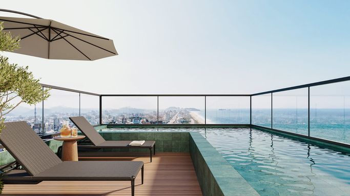 Piscina no roof top com vista mar