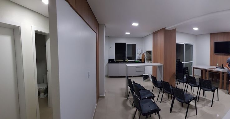 salão de festas térreo mobiliado, com móveis sob medida planejados