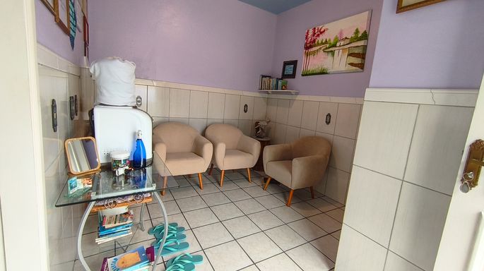 Sala com poltronas - casa à venda em Águas Mornas/SC