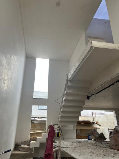 Ambiente de Sala e Copa com Pé Direito Duplo