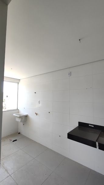 Área de Serviço anexada com cozinha