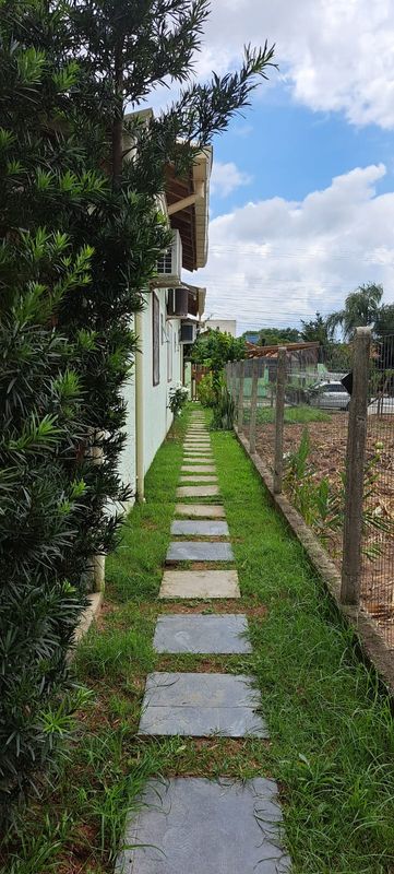 corredor lateral para acessar as Kitnets