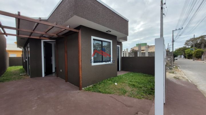 Casa à venda com 3 quartos, 100m² - Foto 2