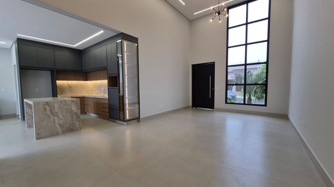 Sala de jantar integrada a sala de estar e cozinha