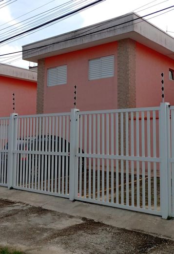 Frente portão garagem