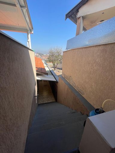 Escada de acesso à casa