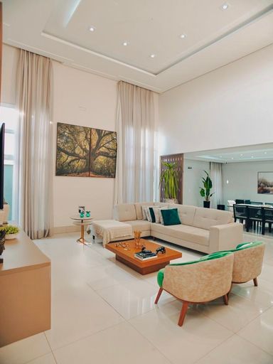Belíssima sala de estar com pé direito alto
