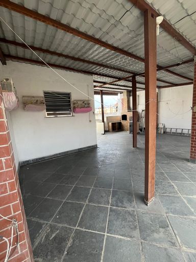 Terraço com um quartinho
