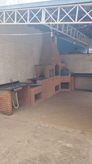 área de churrasqueira e fogão a Lenha