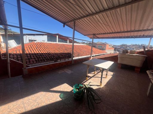area superior a casa