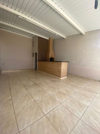 área com churrasqueira com banheiro